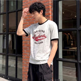 エッセンシャルスタンダード半袖リンガーTシャツアリゾナ メランジ
