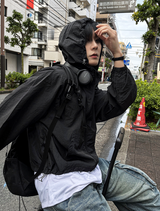 Arc-in-crop windbreaker