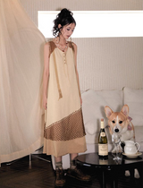 A long, loose and slimming knitted dress for a niche market.