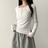 Waistline 🤍 Long-sleeved T-shirt with side shirring slits up to the forearm cover