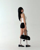 a punching eyelet bustier blouse