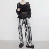 yellow-colored patterned pants