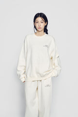 24FW アップサイドダウンロゴナッピングズリーパンツアイボリー