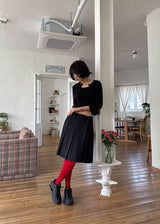 BUTTON MIDI PLEATS SKIRT
