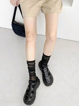 UNIQUE BLACK SANDALS