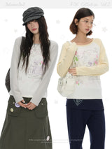 BETWEENAND ミュージックノート ローズプリント ロングスリーブTシャツ