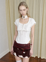 Emoha Stylish Low-Rise Mini Skirt with Glossy Cow-Print Calf Hair Paneling