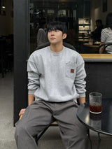 Double pocket patch cropped sweatshirt