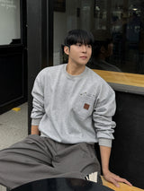 Double pocket patch cropped sweatshirt