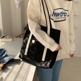 White on black tote bag