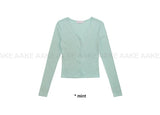 TWIST BUTTON CARDIGAN
