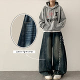 Judd waist back banding diagonal incision deep washing denim wide pants
