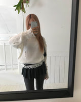 ダメージVニット