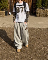 UA カモパッチワイドスウェットパンツ