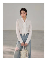 French ribbon tie V-neck blouse