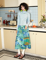 A slim-fit, color-blocked, close-knit turtleneck base layer shirt with a versatile Cuban collar and long sleeves.