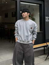 Double pocket patch cropped sweatshirt