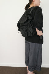 dot string pocket backpack