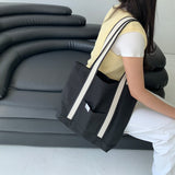White on black tote bag