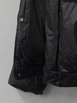 metal brooch overfit leather padding