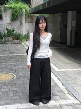 ヌキ ボタン フェミニン ロングスリーブ Tシャツ