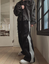 Solid track line two way training pants