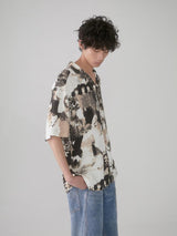 Cuban-style loose and breathable short-sleeved shirt with black and white portrait blur print.