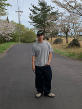 Back-banding raw denim pants