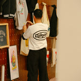 DAKYAM 2025S/S デアトゥードリームロゴプリンティングTシャツ