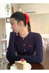 ツイステッドフリルニットロングスリーブカーディガン