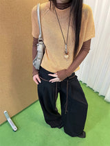 Black high-button-up wide pants