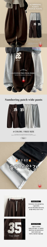Kello 35 patch embroidered pin tuck wide pants