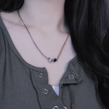 wood round swirl ネックレス