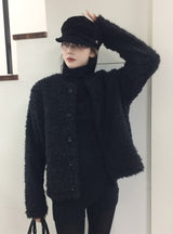 パフオーバーブークレカーディガン