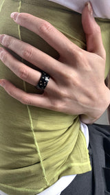 Black metal twinkle dot ring
