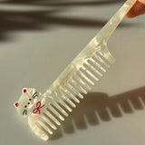 White cat hair brush