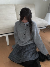 Juke diagonal button high neck knit