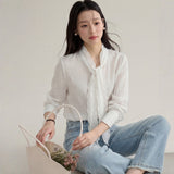 French ribbon tie V-neck blouse