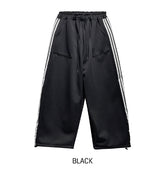 Solid track line two way training pants