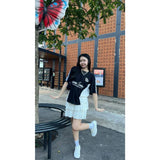 PEANUT STAIN - アクティブ デュオ サイド カーシブ ブラック ボクシー オーバーサイズド Tシャツ