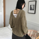 Seomit パンチングツーウェイアイレットバックストラップVネックオーバーフィット長袖ニット