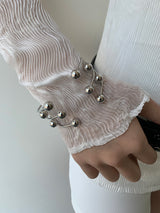 Silver ball piercing bangle