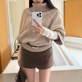 Amangte cape knit