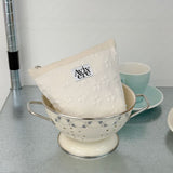 classic pouch_flower ivory