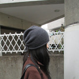 roll up string beanie