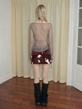 Emoha Stylish Low-Rise Mini Skirt with Glossy Cow-Print Calf Hair Paneling