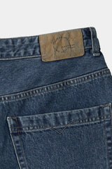 ルーズフィットテーパードデニムパンツ (Washed Blue)