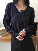 ディープⅤボタンニット