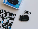 hunched cat keyring