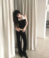 woman in black low button bootcut pt